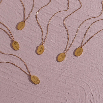 FLEUR OVAL COIN NECKLACE