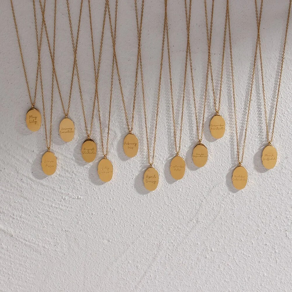 FLEUR OVAL COIN NECKLACE