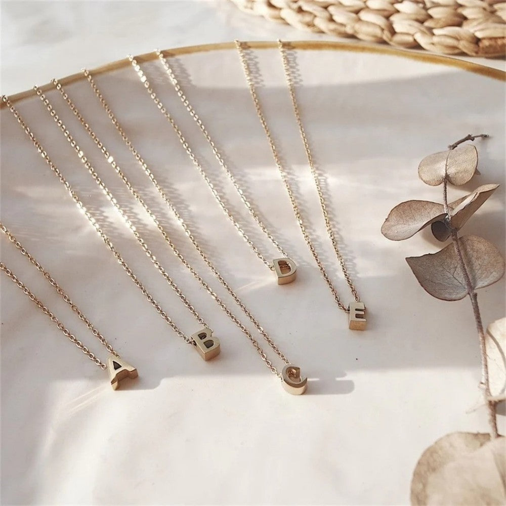 TINY INITIAL NECKLACE