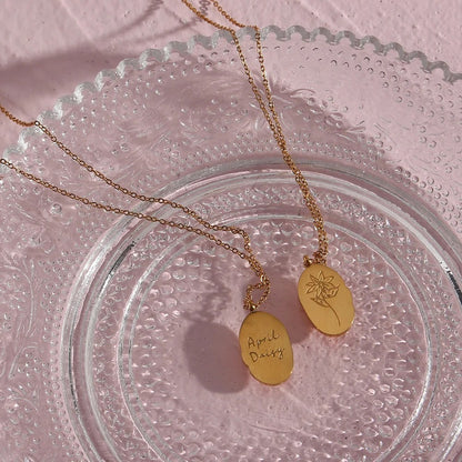 FLEUR OVAL COIN NECKLACE