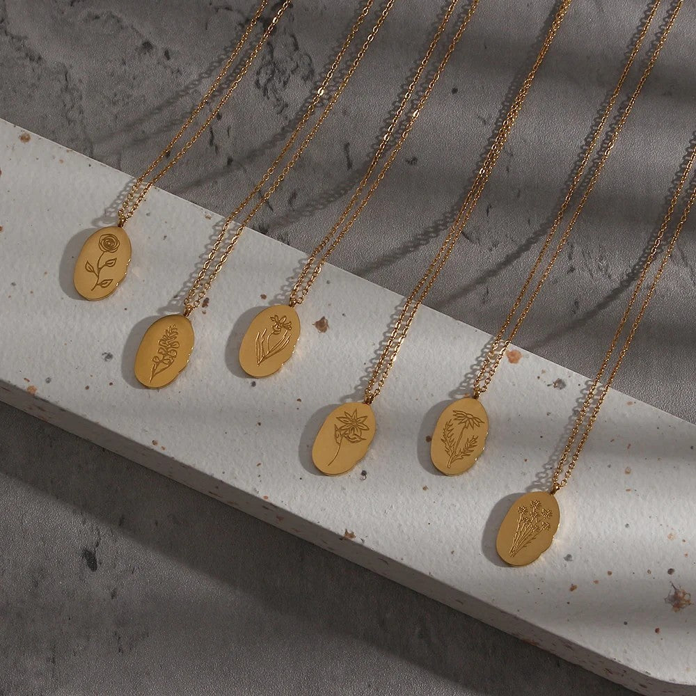 FLEUR OVAL COIN NECKLACE
